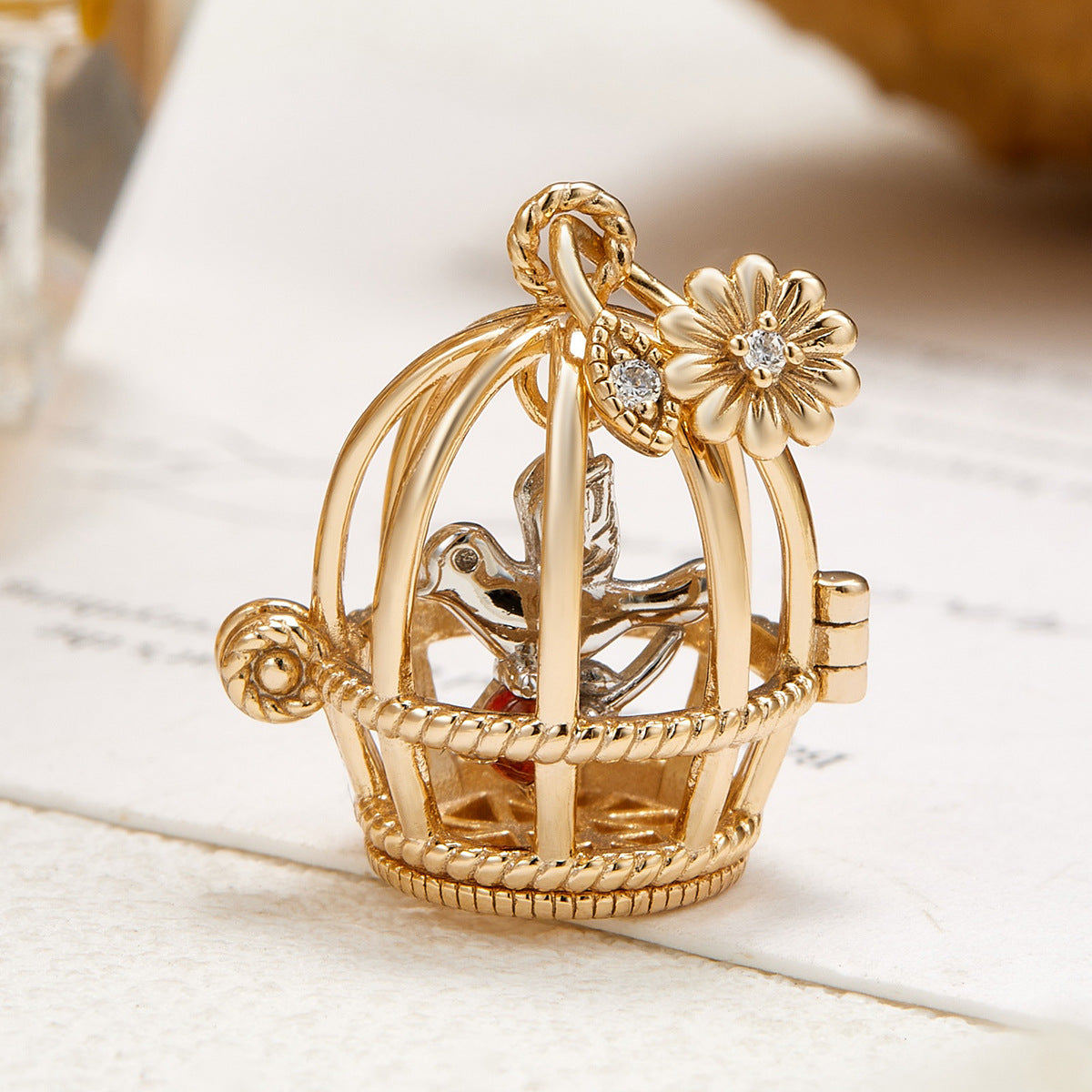 Vintage Style Gold Opening Birdcage Garnet Pendant Necklace, Two-Tone Bird and Floral Bail Charm
