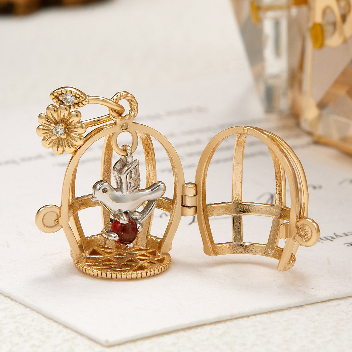 Vintage Style Gold Opening Birdcage Garnet Pendant Necklace, Two-Tone Bird and Floral Bail Charm