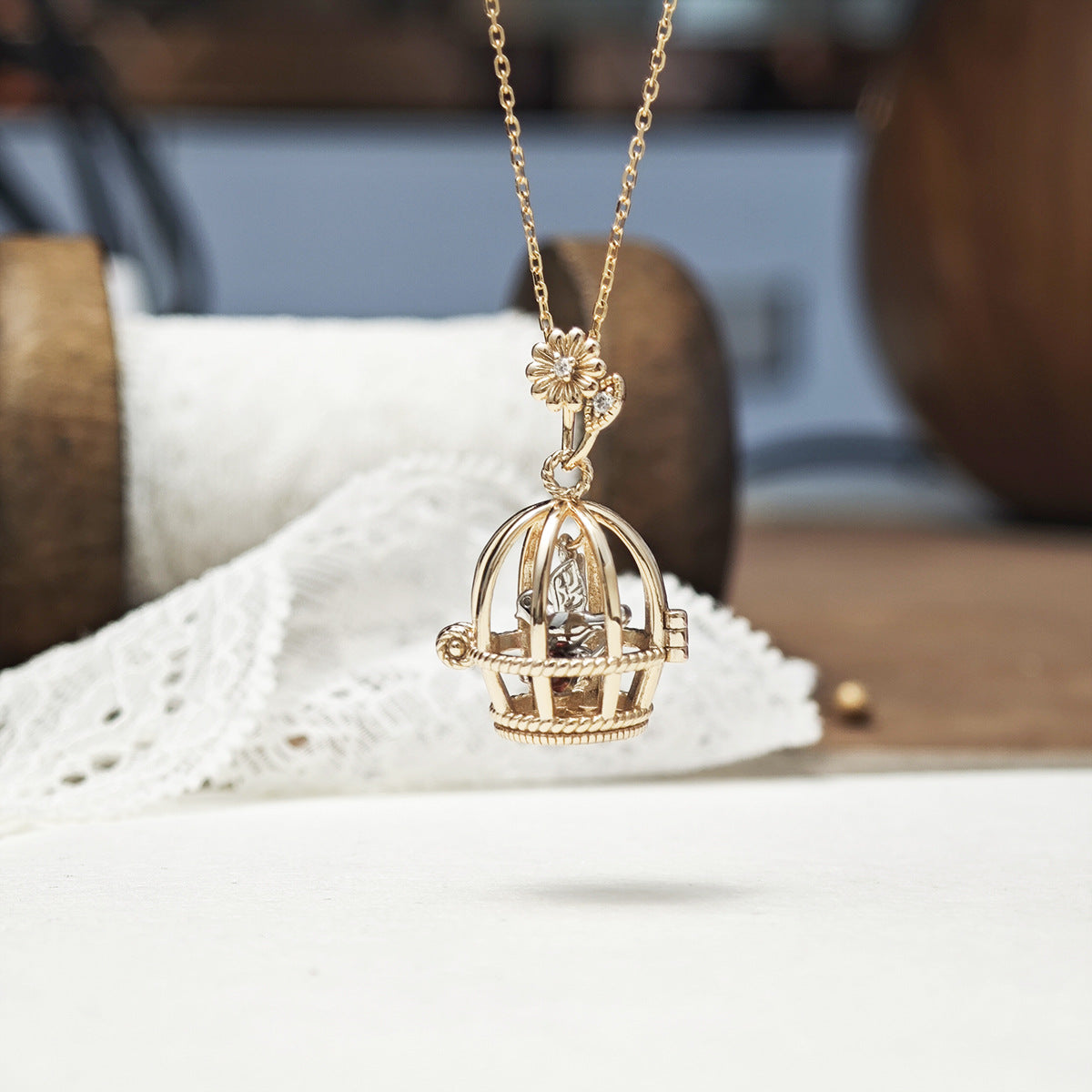 Vintage Style Gold Opening Birdcage Garnet Pendant Necklace, Two-Tone Bird and Floral Bail Charm